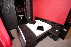 Letto o letti in una camera di Hotel Roma & Tours