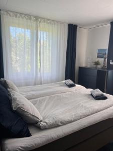 Säng eller sängar i ett rum på Bergkvara Vandrarhem