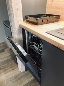 Kuchyň nebo kuchyňský kout v ubytování Lotes apartamenti
