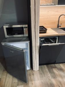 Kuchyň nebo kuchyňský kout v ubytování Lotes apartamenti