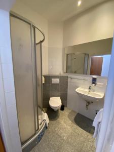 Koupelna v ubytování Kolbeck Rooms