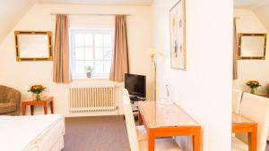 Posezení v ubytování Meyers Hotel Hittfeld