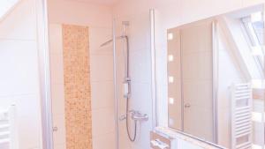 Koupelna v ubytování Meyers Hotel Hittfeld + 18 fotografií