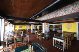 A restaurant or other place to eat at Delphin Beach Hotel