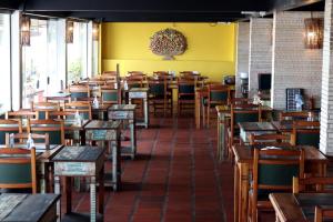 A restaurant or other place to eat at Delphin Beach Hotel
