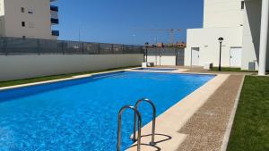 Bazén v ubytovaní Beautiful penthouse with pool and wonderful beach view alebo v jeho blízkosti