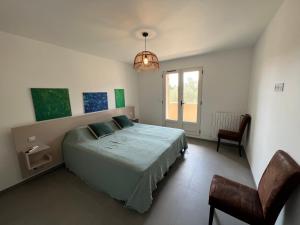 Posteľ alebo postele v izbe v ubytovaní Mas Grenadine, magnifique villa du Piémont Cévenol