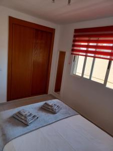 Posteľ alebo postele v izbe v ubytovaní Casa El Nidillo