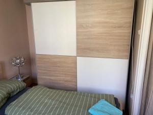 Posteľ alebo postele v izbe v ubytovaní Roland Apartment Downtown - Pozsonyi