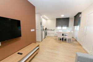 Telewizja i/lub zestaw kina domowego w obiekcie Palacios 30, Playa Nanín