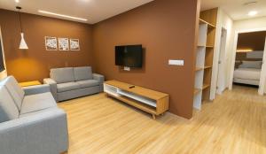 Telewizja i/lub zestaw kina domowego w obiekcie Palacios 30, Playa Nanín