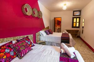 Letto o letti in una camera di Why Not Hotel