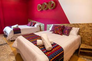 Letto o letti in una camera di Why Not Hotel