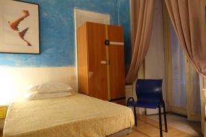 A bed or beds in a room at aKasa di Flock