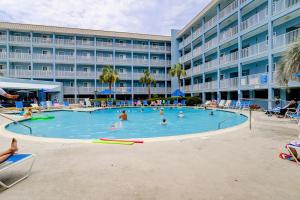 a large pool in front of a hotel at Hilton Head Resort IV in Hilton Head Island +18 photos
