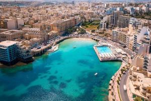 an aerial view of a city with a body of water at Sliema 248 Boutique Studios in Sliema