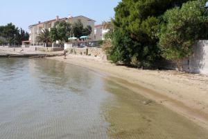 Gallery image of Family friendly apartments with a swimming pool Mundanije, Rab - 5075 in Rab