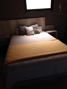 Un pat sau paturi într-o cameră la Balcón de la montaña