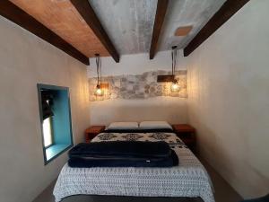 Postel nebo postele na pokoji v ubytování Hotel Pepen