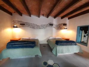 Postel nebo postele na pokoji v ubytování Hotel Pepen