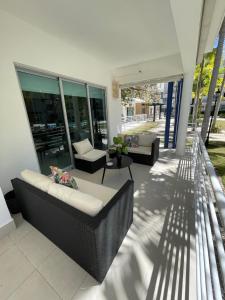 Posezení v ubytování Confort Suite Apt Punta Cana Village con Piscina