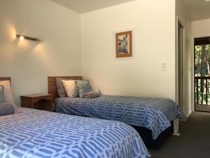 Cama ou camas em um quarto em Kanuka Ridge Lodge
