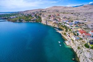 an aerial view of a bay with boats in the water at Studio Zubovici 9365a in Zubovići