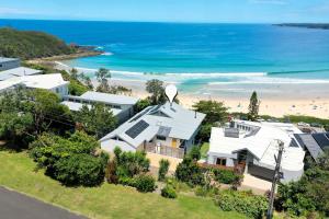 an aerial view of a house near the beach at Northstar on Mollymook Beach in Mollymook
