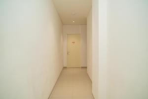 Gambar di galeri bagi Sans Hotel Kupang Indah Surabaya by RedDoorz di Kupang