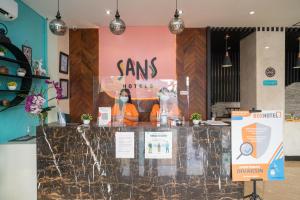 Sijil, anugerah, tanda atau dokumen lain yang dipamerkan di Sans Hotel Kupang Indah Surabaya by RedDoorz