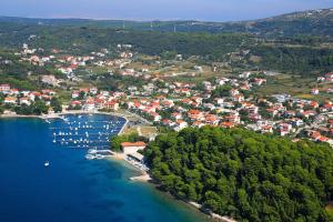 an aerial view of a harbor with boats in the water at Apartments by the sea Palit, Rab - 15794 in Rab