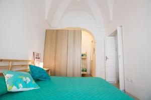 Postel nebo postele na pokoji v ubytování Sotto Il Cielo Di Ostuni - Orsa Minore