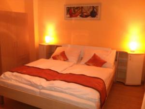 Letto o letti in una camera di Pension VIDHOUS 1