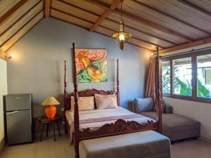 Postel nebo postele na pokoji v ubytování Puri Sabina Bed & Breakfast + 37 fotografií
