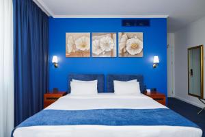 Postel nebo postele na pokoji v ubytování Best Western Plus Congress Hotel Yerevan