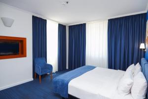 Postel nebo postele na pokoji v ubytování Best Western Plus Congress Hotel Yerevan