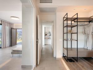 a hallway with a black shelf in a house at Mondethea vantage point home in Chania