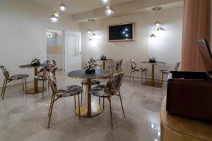 TV a/nebo společenská místnost v ubytování Le margherite B&B