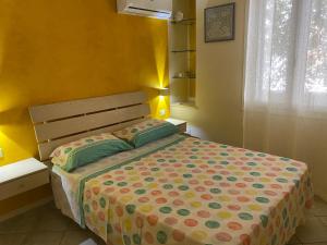 Postel nebo postele na pokoji v ubytování Casa Paola