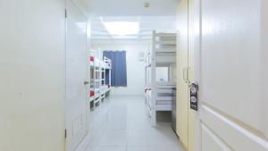 Letto o letti in una camera di RedDoorz @ Insular Square Mandaue City
