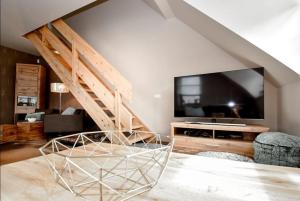 TV a/nebo společenská místnost v ubytování Apartmán s terasou