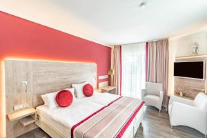 Postel nebo postele na pokoji v ubytování Parkhotel Sonnenberg