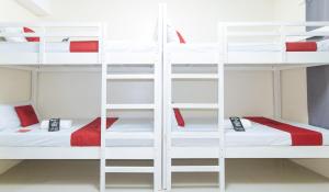 Letto o letti in una camera di RedDoorz @ Insular Square Mandaue City