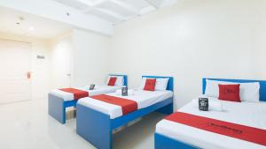 Letto o letti in una camera di RedDoorz @ Insular Square Mandaue City