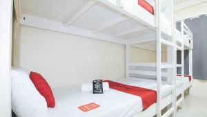 Letto o letti in una camera di RedDoorz @ Insular Square Mandaue City