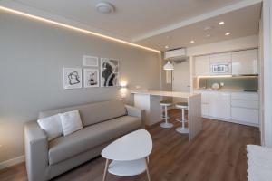 En sittgrupp på PENSION QUINTA EL RETIRO Habitación tipo Apartamento