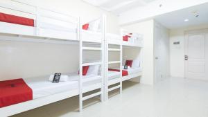 Letto o letti in una camera di RedDoorz @ Insular Square Mandaue City