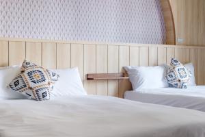 Postel nebo postele na pokoji v ubytování Bing Nong Homestay