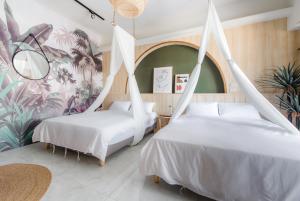 Postel nebo postele na pokoji v ubytování Bing Nong Homestay