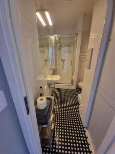 Koupelna v ubytování Apartamenty Duo